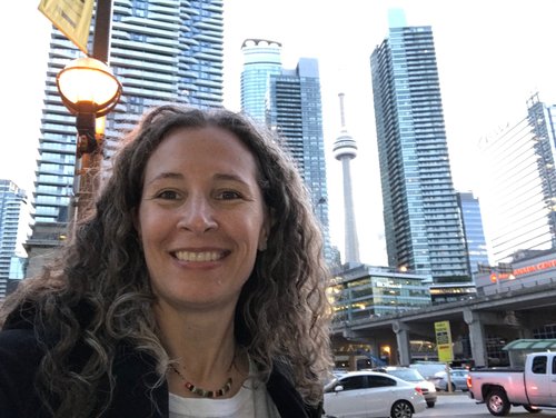 Toronto is beautiful! Behind me is the CN Tower which was completed in 1976 and held the record for the tallest free-standing structure for 5 years.&nbsp;